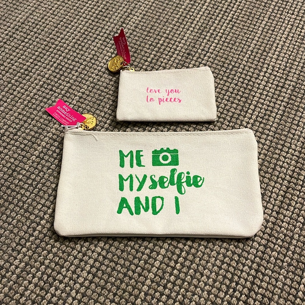 Two brand new adorable pouches with tags. Perfect for stocking stuffers.